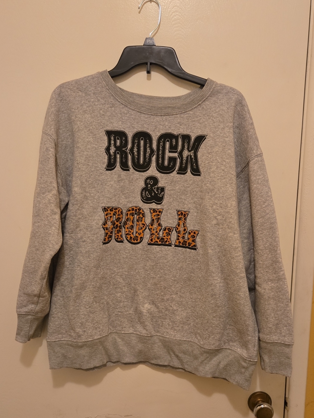 Women's Rock & Roll Grey Graphic Sweatshirt with Leopard Print.